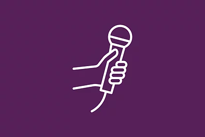 This FES icon shows a hand holding a microphone.