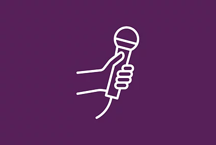 This FES icon shows a hand holding a microphone.